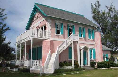 Governor's Harbour House | Restored Historic Cottage on Harbor, Sunset Views, Walk to Town and Beach