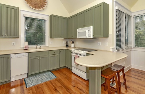 Cape Fear Station House | Reverse floor plan cottage with screened in porch. Nature views!