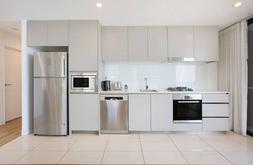 Surfers Paradise Apartment | Rhapsody by the Sea: 360° Ocean Views, Pool & Gym