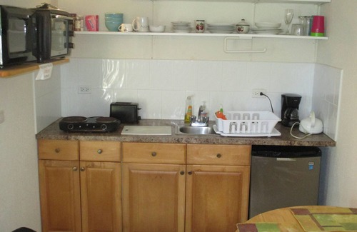 Great Exuma Apartment | Right on HOOPERS BAY BEACHFRONT our COMFORTABLE QUEEN BED STUDIO for 2