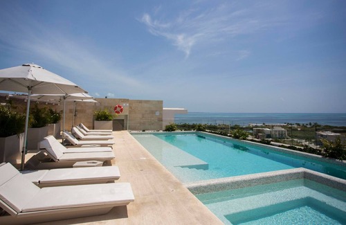 Zona Hotelera Apartment | RIVA 508 · Ocean view condo - Beach, pool & jacuzzi!