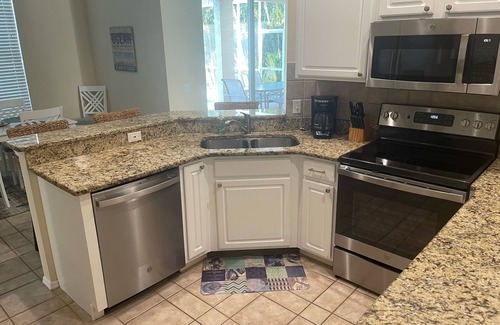 River Pointe House | River Pointe Lakefront 3 BR Ranch Home with Heated Pool