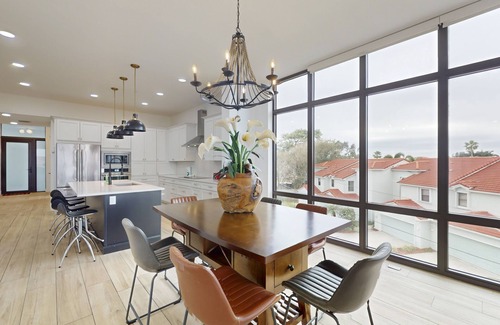Melbourne Beach Condo | River view retreat with on-site pool, hot tub, & dock plus washer/dryer, & AC