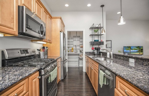 Northeast South Bend House | Riverfront Oasis: Beautiful Riverfront Townhome CLOSE to Notre Dame!