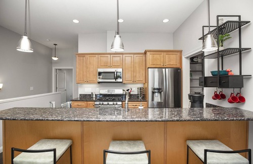 Northeast South Bend House | Riverfront Oasis: Beautiful Riverfront Townhome CLOSE to Notre Dame!