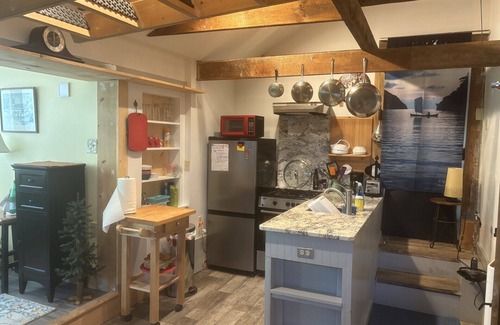 Sutton Cottage | Riverside Cottage in the heart of Historic South Sutton.