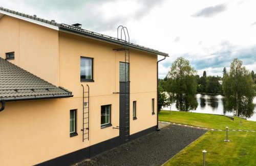 Rovaniemi Apartment | Riverside Luxury Retreat By BookLapland