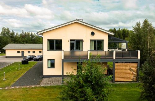 Rovaniemi Apartment | Riverside Luxury Retreat By BookLapland