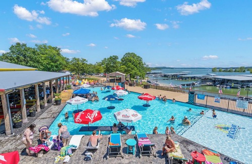 Indian Point Condo | Rock Lane King Suite - Lake View Balcony, Pet Friendly, Tiki Bar, Marina