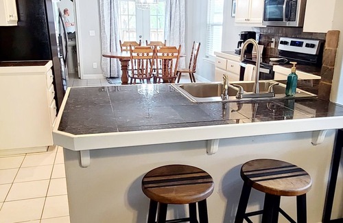 Rogers House | Rogers Retreat, Dog Friendly, Cozy Home. Close to Walmart Amp, Downtown Rogers