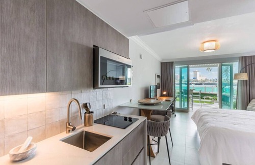 Puerta de Tierra Condo | Romantic Oceanfront Private Patio Full Generator
