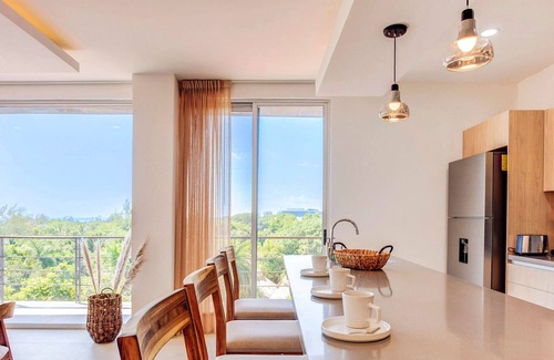 Villa Juarez Condo | Rooftop Retreat | Pool | Gym | BBQ | Near Beach!