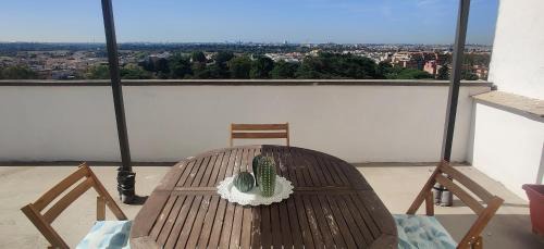 Tuscolano Apartment | Rooftop via Appia Nuova, Roma