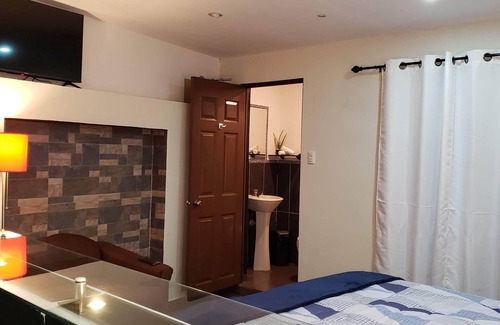 San Salvador Bed & Breakfast | Room #2 private bathroom, surrounded by garden in a private house.