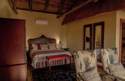 Mookgopong House | Room in Guest Room - Mmakuba Private Game Lodge, Deluxe Chalet 7C