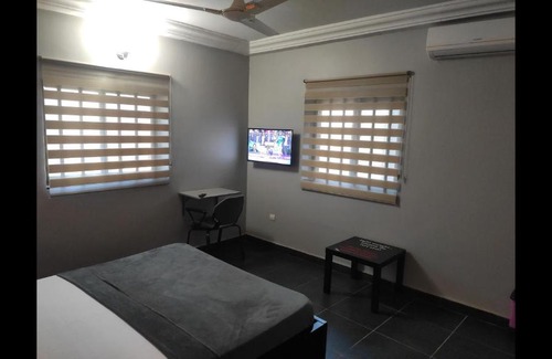 Lome House | Room in Guest room - Royal Blue Guest House Bar