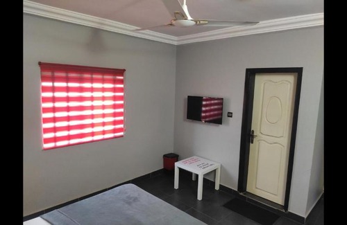 Lome House | Room in Guest room - Royal Blue Guest House Bar