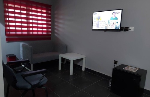 Lome House | Room in Guest room - Royal Blue Guest House Bar