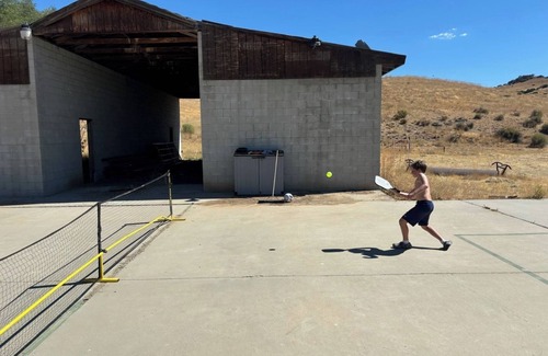 Maricopa Cabin | Room w/floor-to-ceiling Window in Glamping Resort w/Pet Park near Outdoor Fun