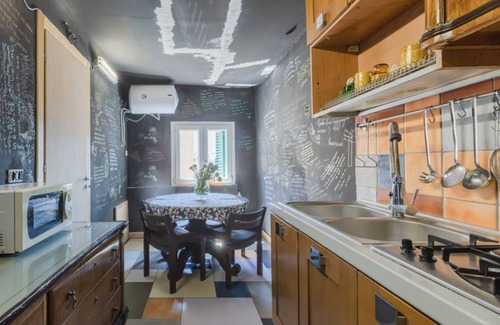 Albergheria Apartment | Roomy apartment of about 110 sqm, with characteristic finishes, able to accommodate up to 10 people, located on the third floor of a renovated building (NO lift). The property is located in the center of Palermo, in a Restricted-Traffic Area, a short dis