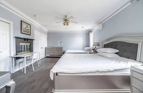Richmond Bed & Breakfast | Royal Serenity Suite with 1 king and 1 queen bed, huge bathroom, walk-in closet.