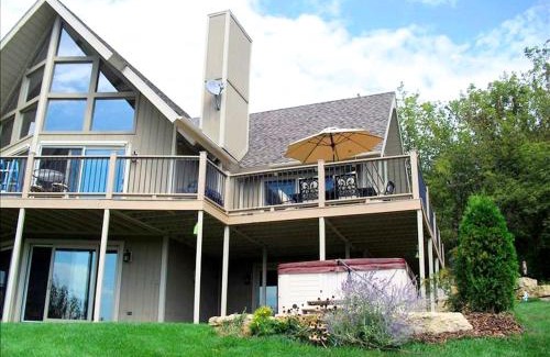 The Galena Territory House | Rural Cabin Rental with a Hot Tub and Pool Access near Lake Galena, Illinois