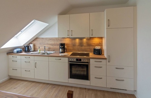 Neßmeraltendeich Apartment | Rurally situated upper apartment "Hauptdeich" near Neßmersiel