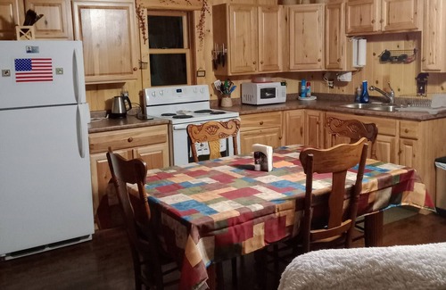 Woodgate Cabin | Rustic cabin - just minutes from miles of hiking trails!