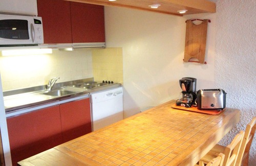 Val-d'Isere Apartment | Rustic Duplex Apartment with Large South-Facing Terrace Near Val-d'Isère Village