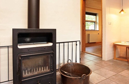 Sundstrup House | Rustic Holiday Home in Hojslev with Sauna