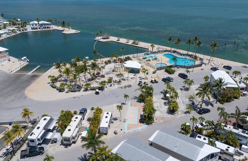 Cudjoe Key RV Rental | RV Lot 301 Venture Out, Pull-through Lot near the Ocean and Pool - Golf cart friendly!