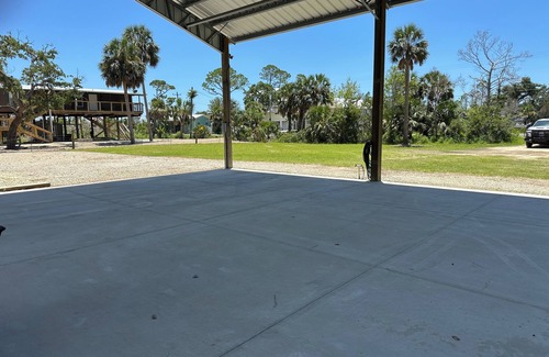Steinhatchee RV Rental | RV site- featuring covered outdoor area for enjoyment regardless of the weather!