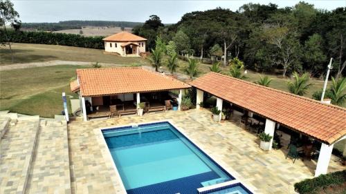 Quadra House | Sítio Aconchegante com Piscina e Wi-Fi