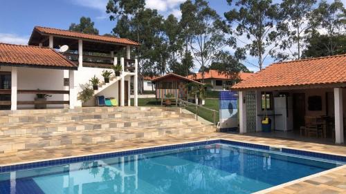 Quadra House | Sítio Aconchegante com Piscina e Wi-Fi