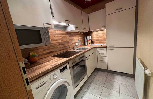 Maxlrain Apartment | Sachrang: Ferien-wohnung am See mit Bergblick