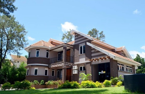 Entebbe Apartment | Saffron Beach Bistro & Cottages - Executive Room 4