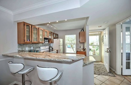 Hammock Bay Condo | Sail Away to Palm Tree Paradise