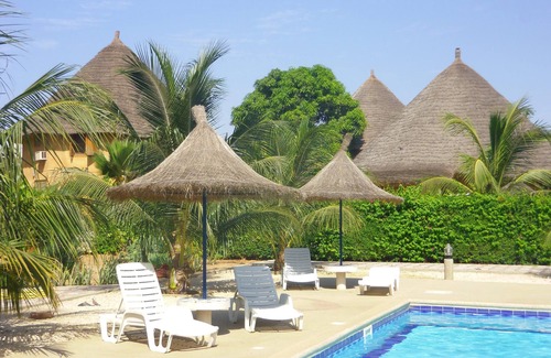 Saly House | Saly: SUN and disorientation assured in an african residential villa.