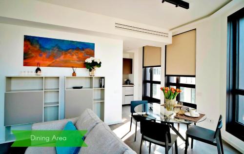 San Babila Apartment | San Babila Central Tower with panoramic terrace overlooking Duomo by Rentopolis