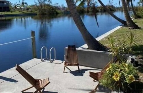 Mariner Villa | Sanctuary w/covered heated saltwater pool on canal