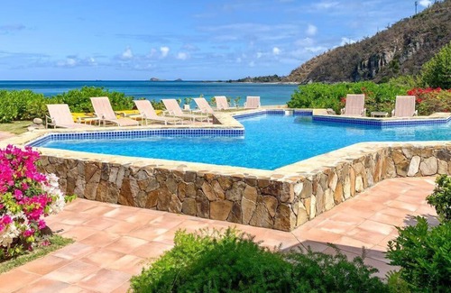 Spanish Town Villa | Sand Castle in Mahoe Bay by Personal Villas - Gazing Over the Tropical Gardens,
