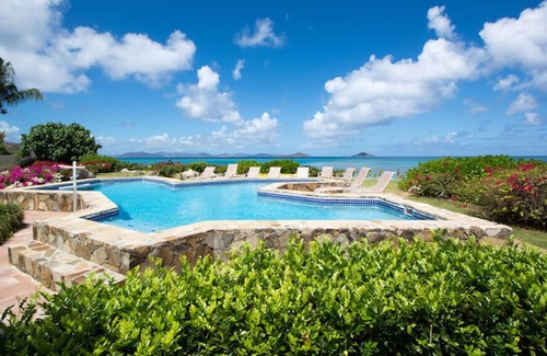 Spanish Town Villa | Sand Castle in Mahoe Bay by Personal Villas - Gazing Over the Tropical Gardens,