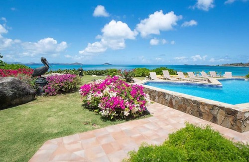 Spanish Town Villa | Sand Castle in Mahoe Bay by Personal Villas - Gazing Over the Tropical Gardens,