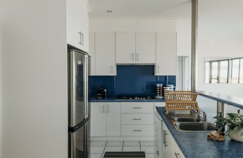 Corlette House | Sandy Point Beach House - On The Waterfront. Mid Week Stay Special Is Now On.