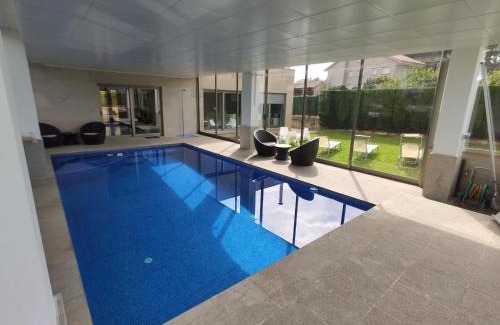Sanxenxo House | Sanxenxo Casa Rial 47 con PISCINA CLIMATIZADA