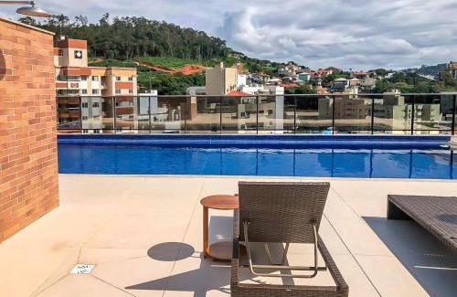 Corrego Grande Apartment | Sapphire Studios: Conforto no Córrego Grande P528