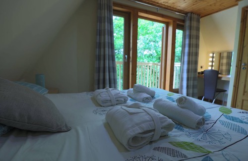 Liverton Cabin | Scandinavian style lodge with hot tub/sauna in 130 acres of woodland