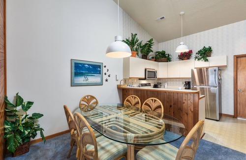 Kitty Hawk Condo | Sea Dunes condo with community pool and tennis, beach access, porch swing, baby gate, and WiFi
