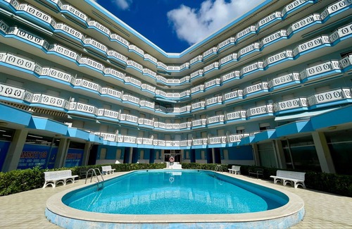 Porto Santa Margherita Apartment | Sea front apartment in a residence with pool