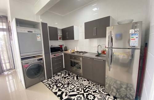 Flic-en-Flac Apartment | Sea View apartment near the beach and restaurants, with Roof Top swimming pool.